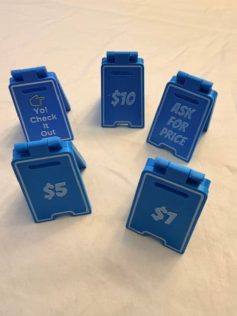 More printed price-card holders, including "$10," "Ask for Price," and "Yo! Check It Out"